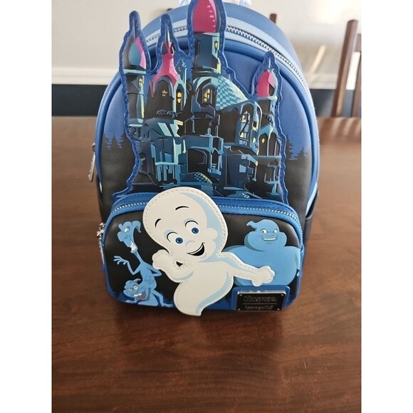 Loungefly Handbags - Loungefly Casper the ghost Glow Mini Backpack
